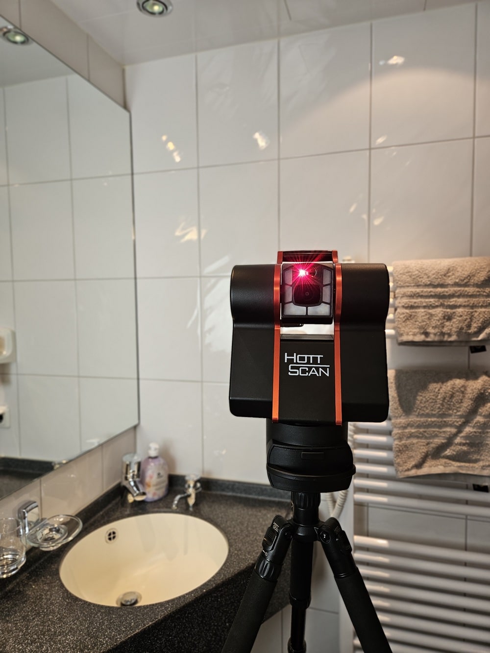 HS-1 roomscanner in bathroom besides towels